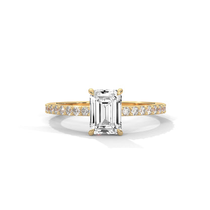 Elegant Emerald Side Stone Ring
