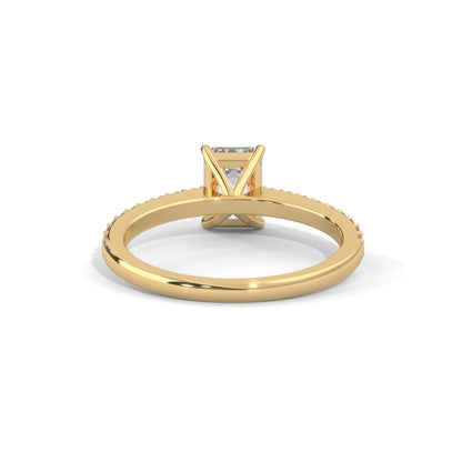 Elegant Emerald Side Stone Ring