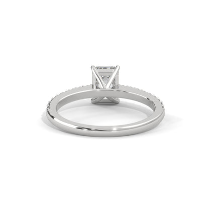 Elegant Emerald Side Stone Ring
