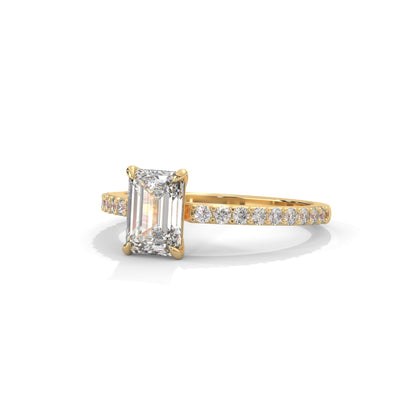 Elegant Emerald Side Stone Ring