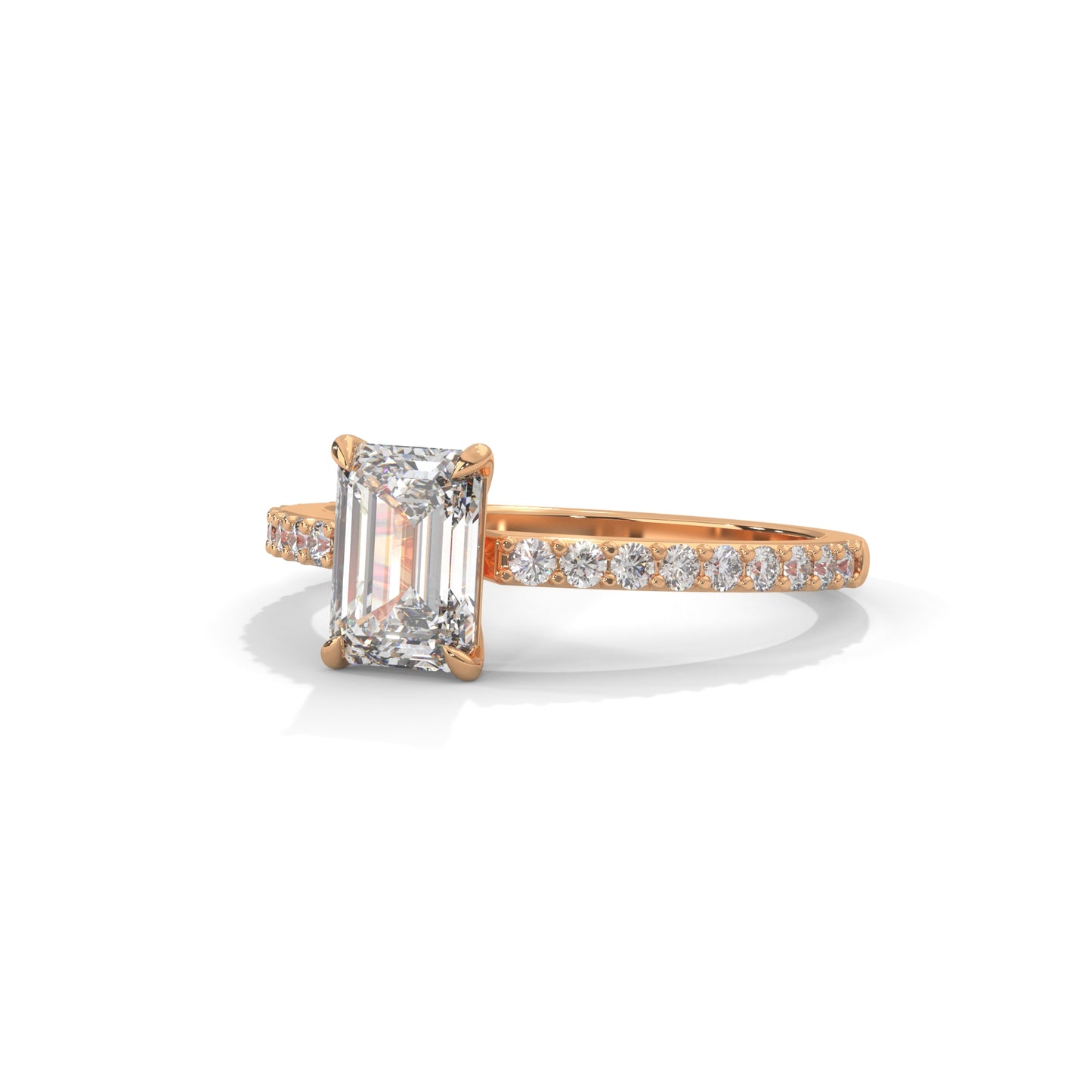 Elegant Emerald Side Stone Ring