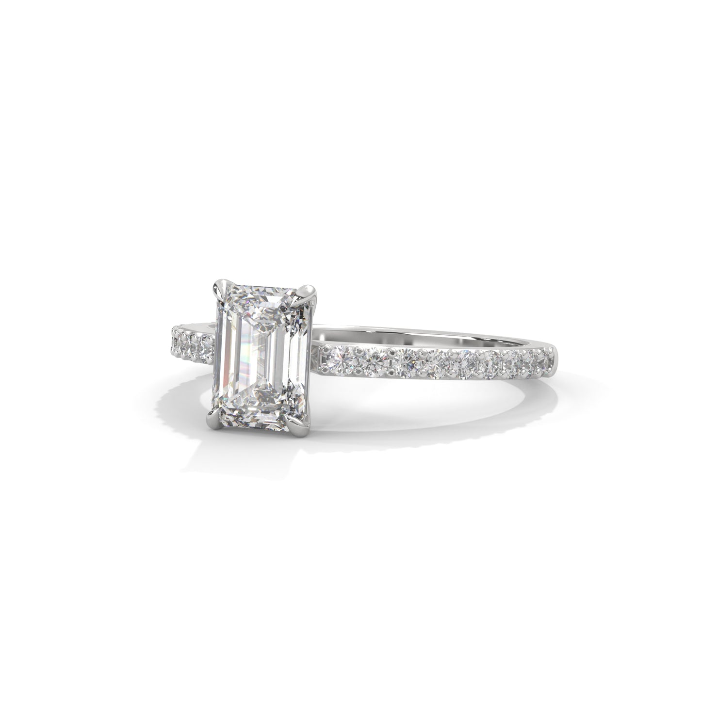 Elegant Emerald Side Stone Ring