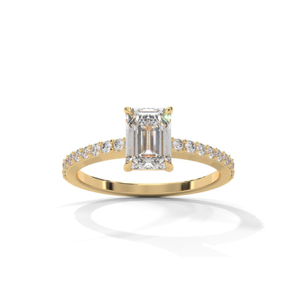 Elegant Emerald Side Stone Ring