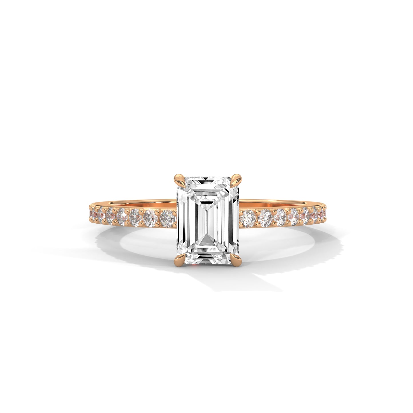 Elegant Emerald Side Stone Ring