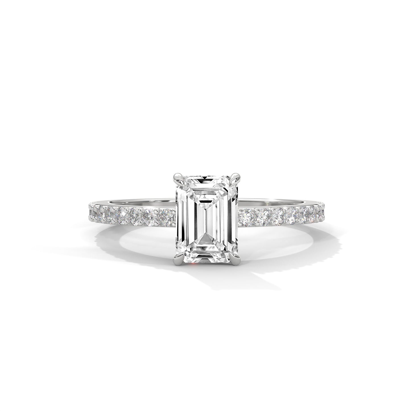Elegant Emerald Side Stone Ring