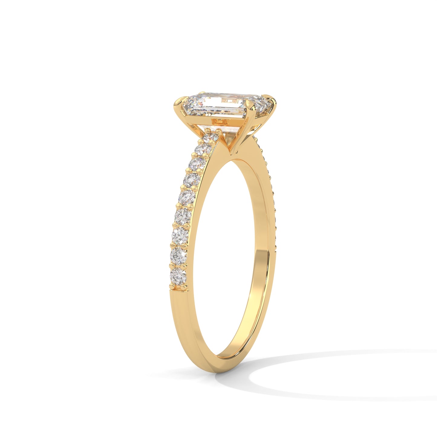 Elegant Emerald Side Stone Ring