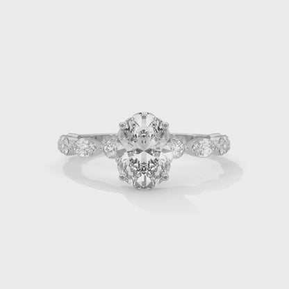 Opulent Oval Side Stone Ring